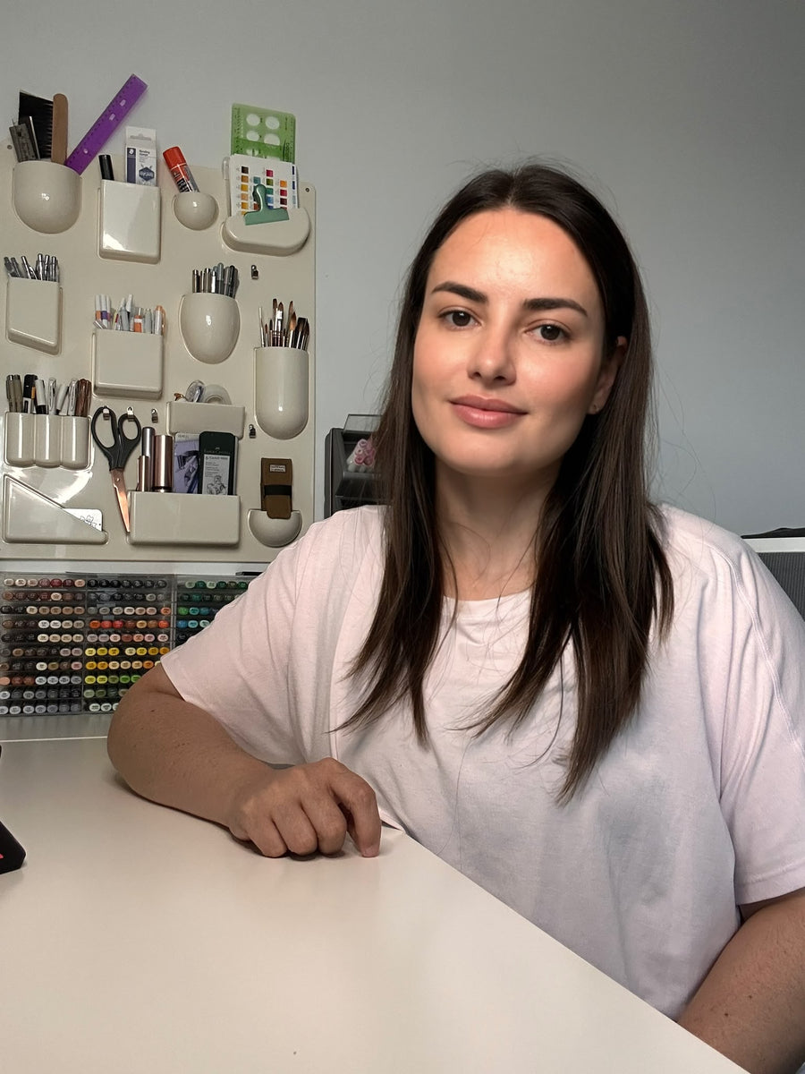 Luciana at her studio desk